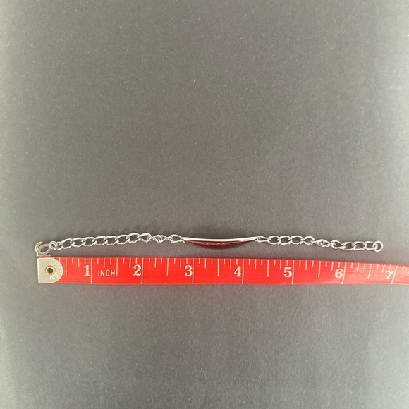 Z55-Costume jewelry-Silver colored bracelet that is engraved “Dottie”. - Picture 5 of 6